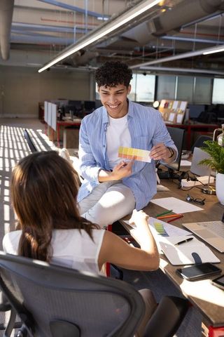 Creative team collaboration in modern open-plan office
