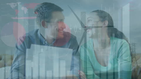 Smiling Couple Discusses Data with Digital Overlay