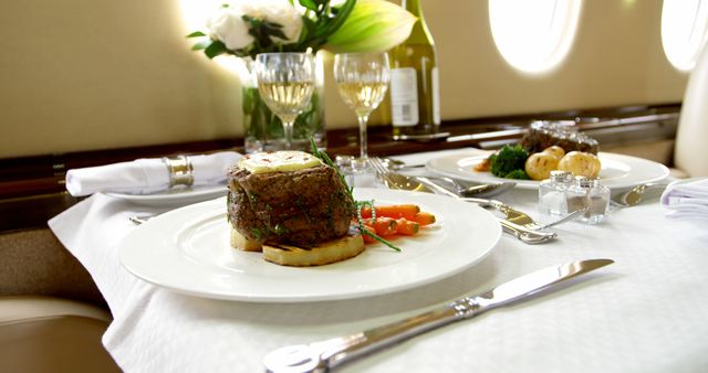 Food and drink served on a table in private jet 4k