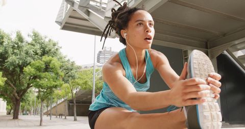 Motivated Athlete Stretching for Urban Workout Routine - Download Free Stock Images Pikwizard.com