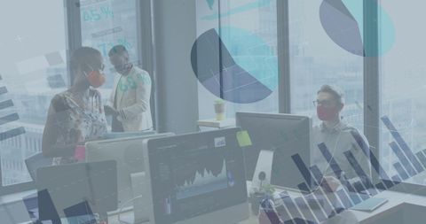 Business Team Analyzing Financial Data During Pandemic in Office