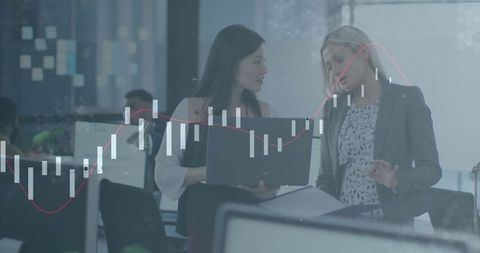 Business Analysts Collaborating on Financial Strategy with Data Overlay