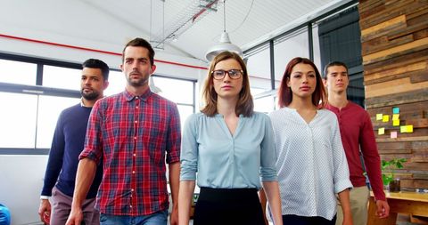 Confident Business Team Walking In Modern Office Environment - Download Free Stock Images Pikwizard.com