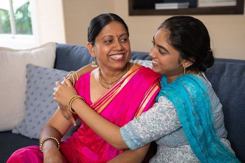 Indian Mother and Daughter Sharing Joyful Bonding Moment at Home