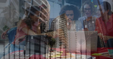 Diverse Team Collaborating Amid Stock Market Analysis