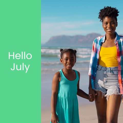 Happy July: African American Mother and Daughter Enjoying Beach