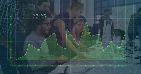 Team analyzing data on desktop monitors with green line chart overlay in open office