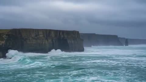 Dramatic Ocean Waves Crashing Against Coastal Cliffs