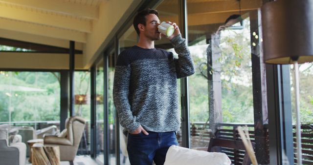 Man Enjoying Coffee in Modern Cozy Living Room - Download Free Stock Images Pikwizard.com