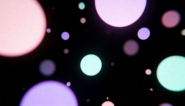 Glowing mint-green orb floating over deep black with pastel bokeh circles and soft halos