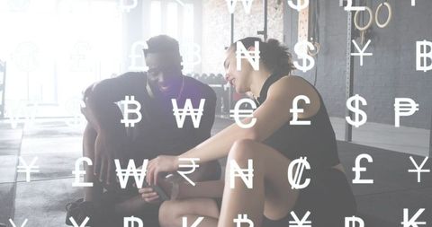 Fitness partners leaning and smiling checking mobile app with currency symbols overlay