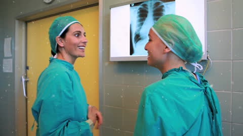 Female Surgeons Discussing with Falling Snow Animation