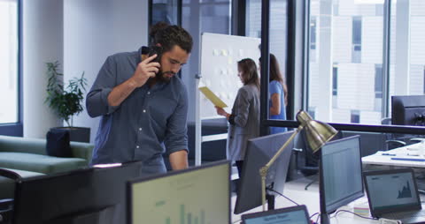 Professional Businessman Communicating in Modern Office Environment