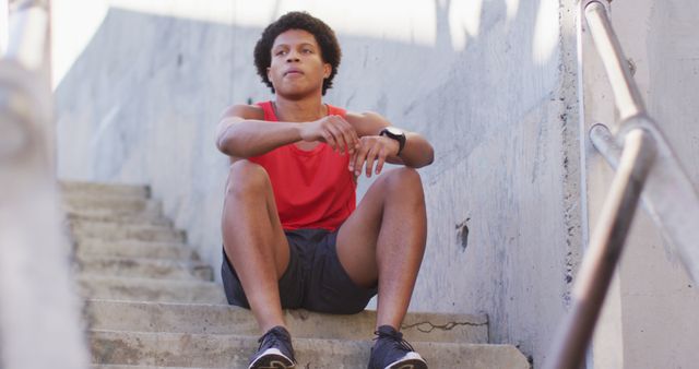 Exhausted Athlete Resting on Stairs after Workout - Download Free Stock Images Pikwizard.com