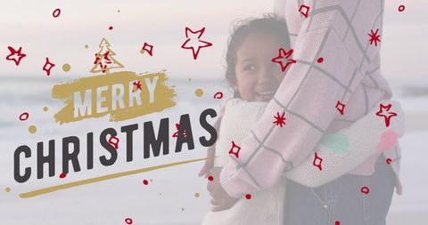 Mother and Daughter Celebrating Christmas on Beach
