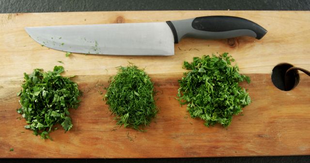 Fresh Chopped Herbs on Cutting Board with Knife - Download Free Stock Images Pikwizard.com