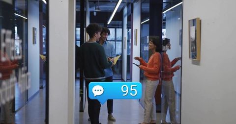 Professional Team Collaboration in Office Corridor