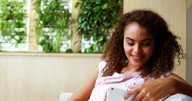 Young Woman Relaxing with Tablet in Modern Home - Download Free Stock Images Pikwizard.com