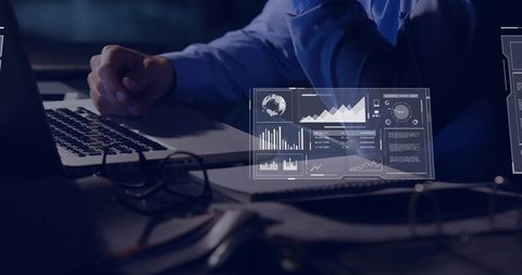 Businessman Analyzing Data with Digital Dashboard in Modern Office