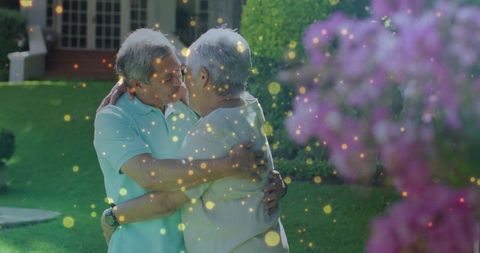 Senior couple embracing in tranquil garden setting