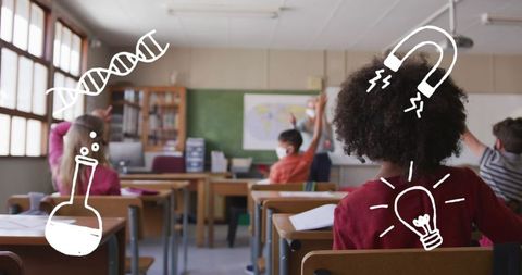 Children wearing face masks learning with educational icons