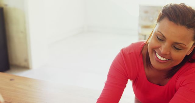 Smiling Woman Reaching Across Table - Download Free Stock Images Pikwizard.com