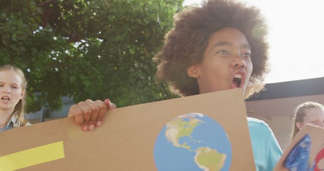 Youth Participating in Environmental Protest Outdoors - Download Free Stock Images Pikwizard.com