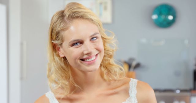 Smiling Blonde Woman at Home in Casual Top - Download Free Stock Images Pikwizard.com