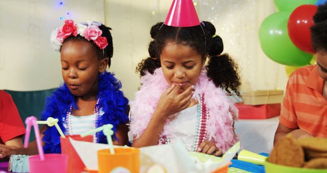 Children Enjoying Birthday Celebration with Costumes and Snacks - Download Free Stock Images Pikwizard.com