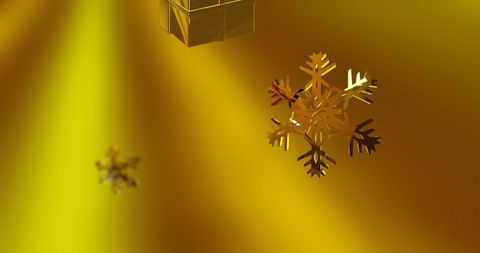 Golden Snowflakes on Shimmering Gold Background for Festive Celebrations