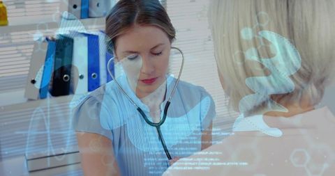 Clinician listening with stethoscope during lung exam with holographic breathing overlays