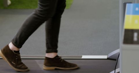 Person Exercising on Treadmill Desk in Modern Office - Download Free Stock Images Pikwizard.com