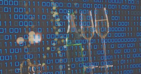 Celebrating with champagne flutes and glowing binary overlay blending party and tech