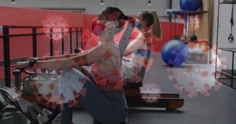 Women Exercising in Gym Overlaid with Covid-19 Visuals