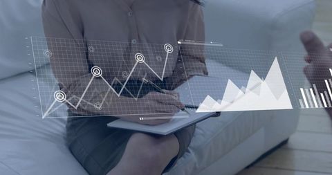 Business woman taking notes on sofa with analytics charts and collaboration graphs