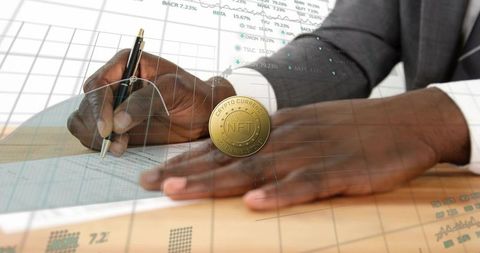 Signing contract overlaying nft crypto coin, financial charts, data analytics