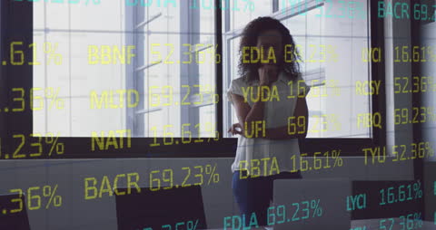 Thoughtful Woman Analyzing Stock Market Data in Office Setting