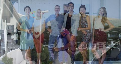 Diverse Business Team Smiling in Modern Conference Environment