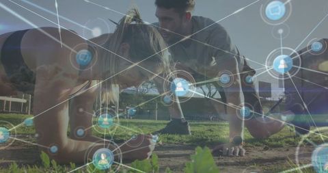 Athletic Duo Exercising Outdoors with Digital Network Concept
