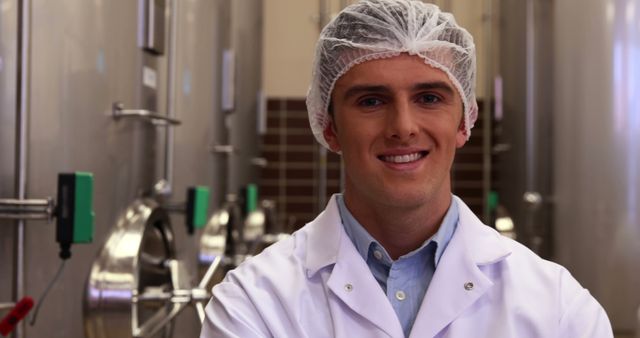 Smiling Food Technician in Hygienic Laboratory - Download Free Stock Images Pikwizard.com