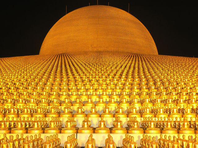This visually stunning scene of thousands of golden Buddha statues illuminated at night showcases a spectacular spiritual site. The serene atmosphere and vast expanse of golden figures are perfect for content related to spirituality, Buddhism, religious practices, cultural events, and Eastern philosophies. It provides a captivating visual for travel guides, spiritual journey blogs, and cultural education materials.