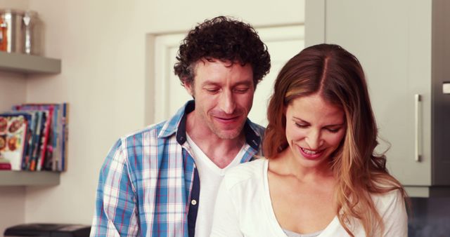 Smiling Couple Cooking Together Drinking Wine Enjoying Domestic Life - Download Free Stock Images Pikwizard.com