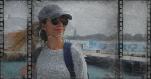 Woman at Waterfront Dock with Film Texture for Urban Adventure Theme