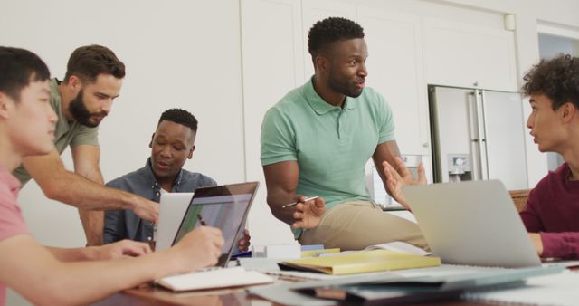 Diverse Group of Young Professionals Collaborating in Office - Download Free Stock Images Pikwizard.com