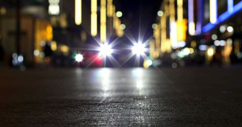 Defocused City Street Lights with Shining Car Headlights at Night - Download Free Stock Images Pikwizard.com