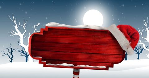 Blank Wooden Christmas Sign with Santa Hat in Snowy Landscape - Download Free Stock Images Pikwizard.com