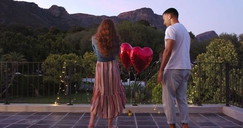 Romantic Proposal Surprise with Scenic Backdrop