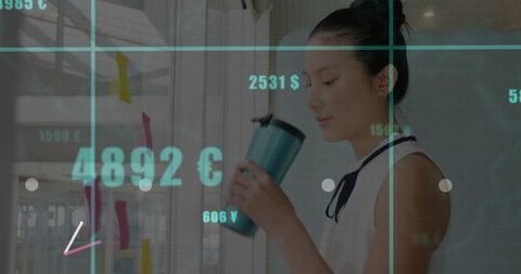 Business Professional Analyzing Currency Exchange Rates in Office