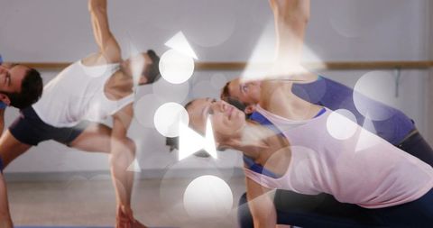 Group yoga stretching woman reaching and bending in triangle pose with light overlays