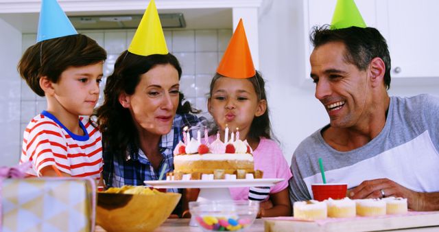 Joyful Family Birthday Celebration in Bright Kitchen - Download Free Stock Images Pikwizard.com